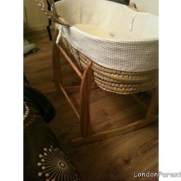 Moses basket on rocking stand 